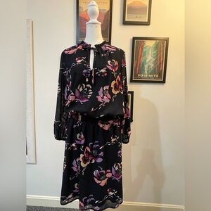Floral dress with smocked waist, dark navy w vibrant colors, never worn! Size M